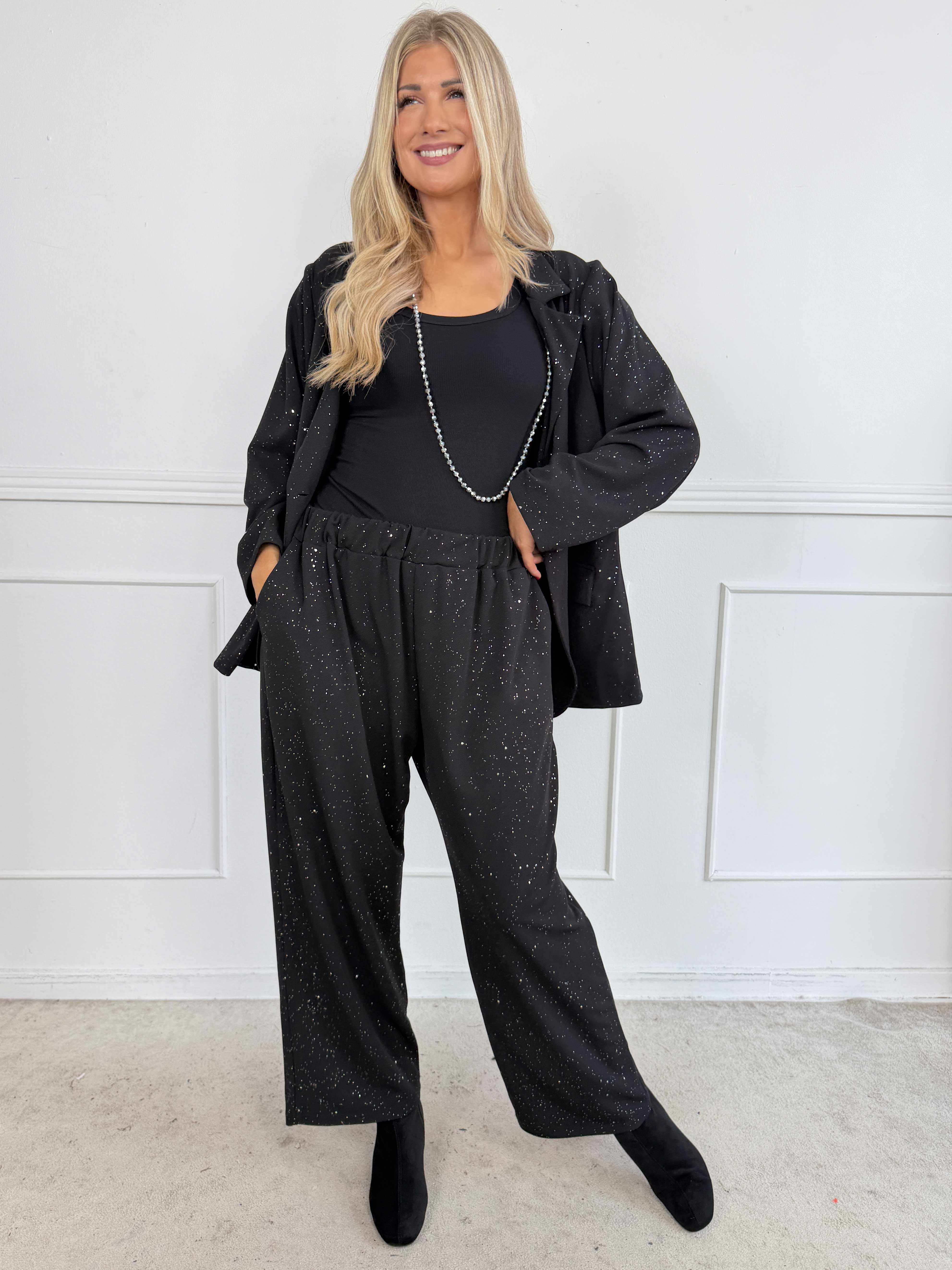 Medea Pants - Eleganta byxor med fint glitterdamm som ger en exklusiv look